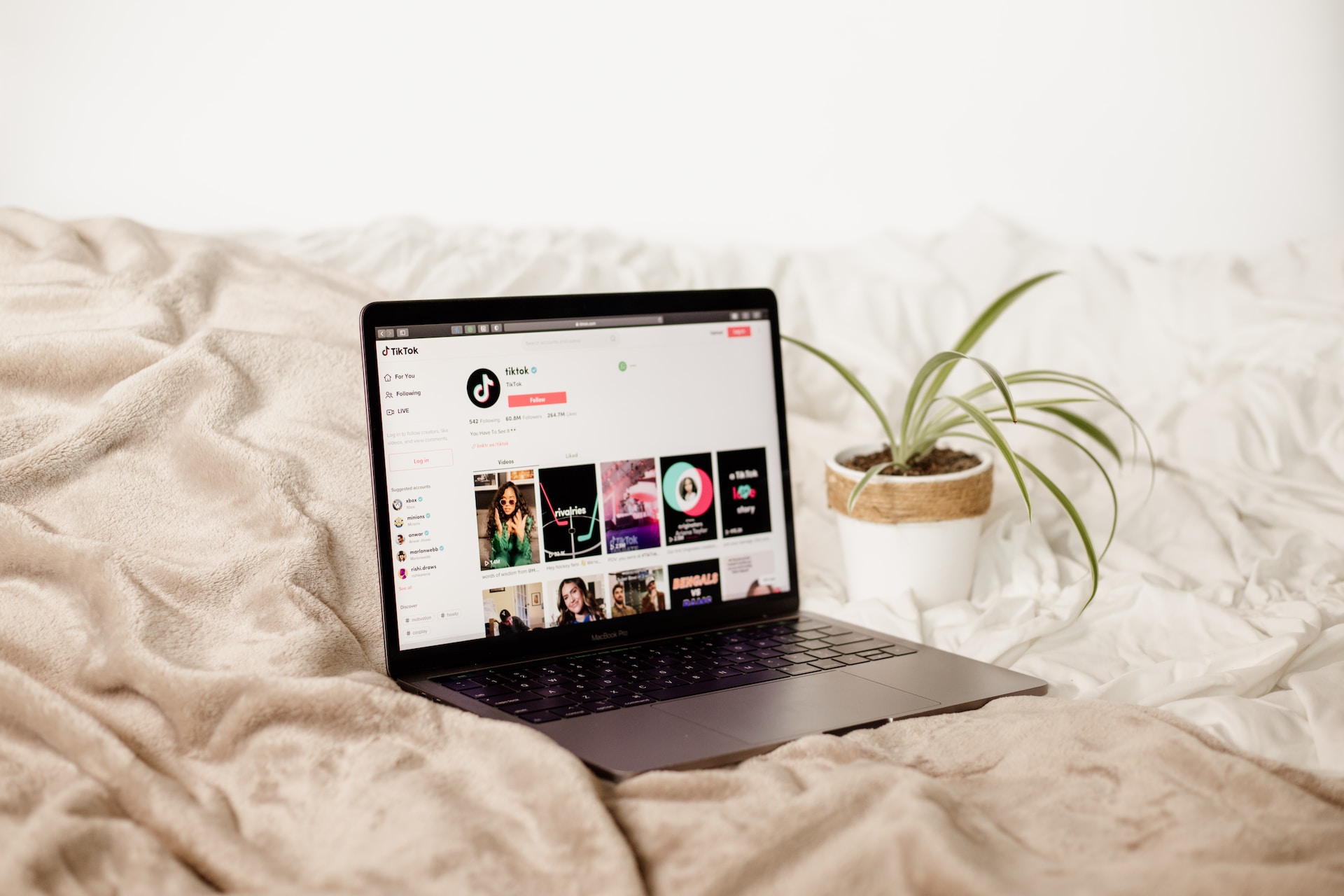 A laptop showing the tiktok feed